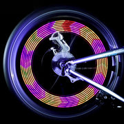 LED spoke light mounted on a mountain bike wheel