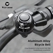 Aluminium bike bell mounted on a handlebar