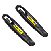 Tyre levers shown against a hand for scale